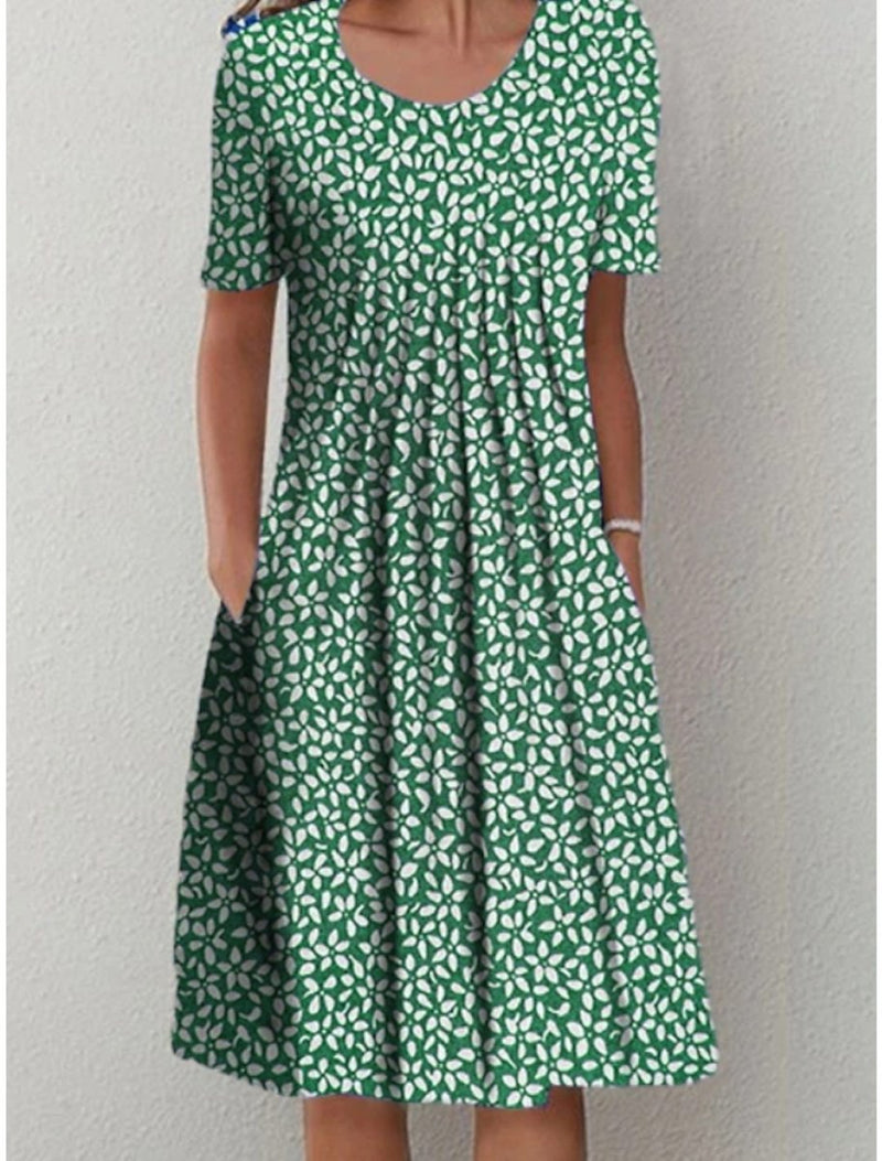 Camilla - Blomstret Kjole med Lommer i Casual Stil